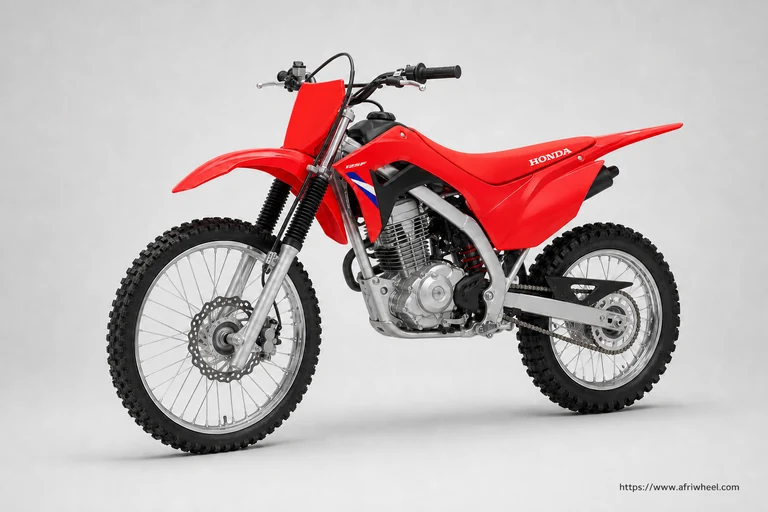 Honda CRF125F in Extreme Red, front-left three-quarter Big Wheel studio hero