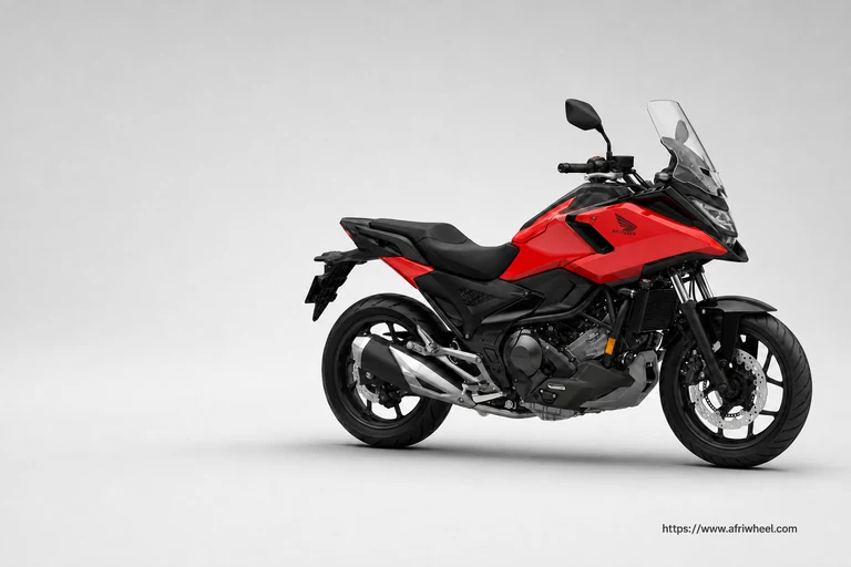 Honda NC750XD DCT in Fighting Red with Graphite Black trim, front three-quarter studio view