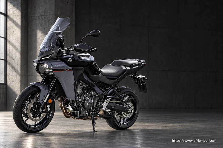 Yamaha 2025 Tracer 9 in black and dark grey, full front-left three-quarter motorcycle hero
