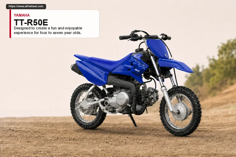 Yamaha TT-R50E in Team Yamaha Blue, front three-quarter hero view on an off-road surface