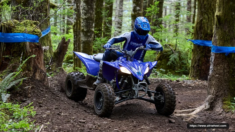 Yamaha 2025 YFZ450R in Yamaha Blue, front three-quarter racing action view